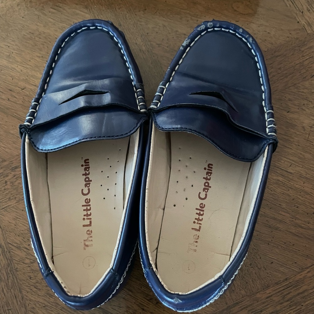 The little captain boy’s loafers